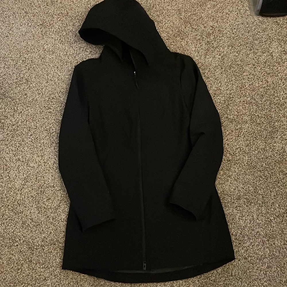 Women’s black workout style raincoat